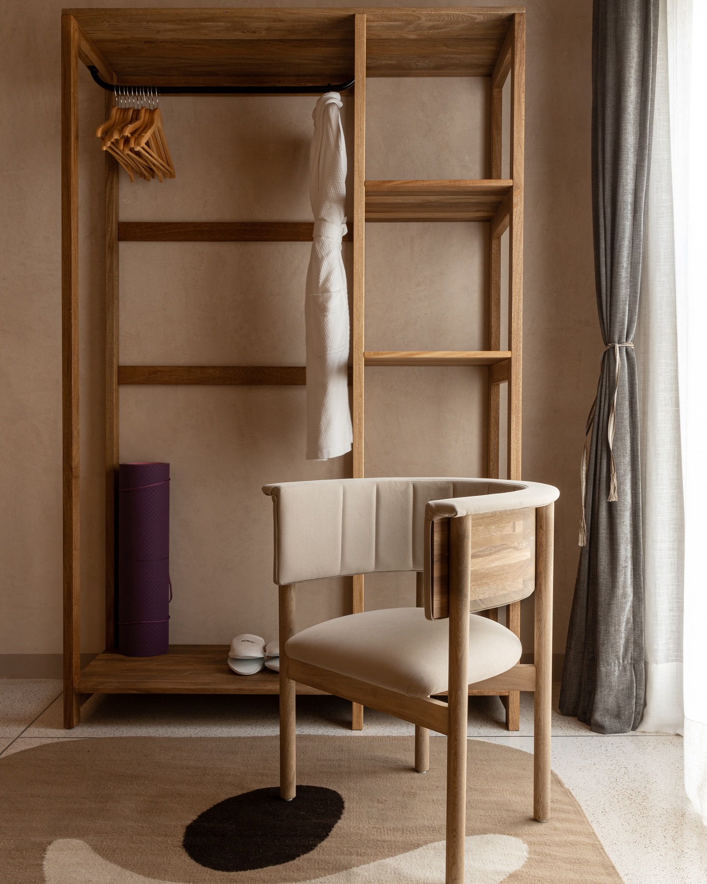 Casa Antonieta: Open closet and wood chair at Casa Antonieta
